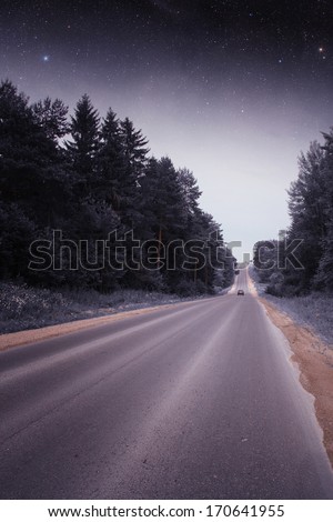 road at night. Elements of this image furnished by NASA
