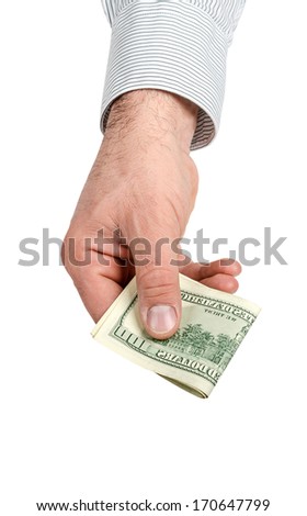 Hand holding money isolated on white background