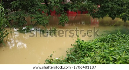 Flood in Kerala. A small restaurant fully surrounded by water, due to heavy rain and flood.