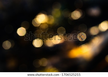 Beautiful lights bokeh reflecting from spring water.