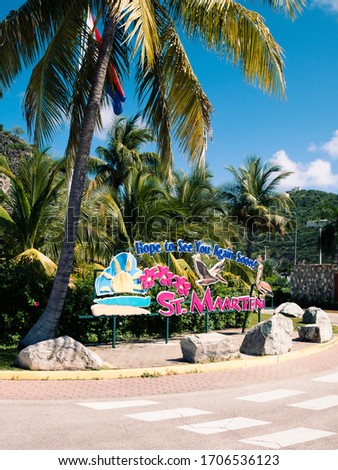 Welcoming Saint Martin sign at sunny weather..