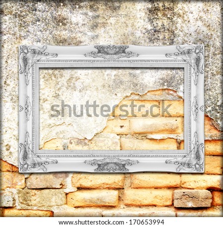 old picture frame antique vintage  on the brick wall background