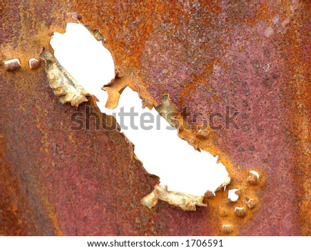 Hole in rusty metal