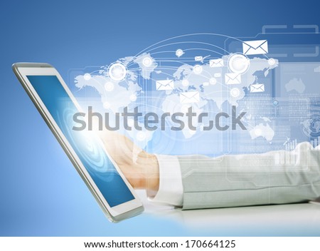Close up image of human hand holding tablet pc