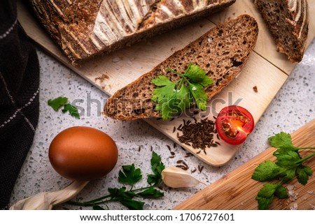 Background with bread, rolls, vegetables and herbs