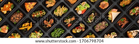 Collection of black plastic take away boxes with healthy food. Set of containers with everyday meals - meat, vegetables and law fat snacks on black background Royalty-Free Stock Photo #1706798704