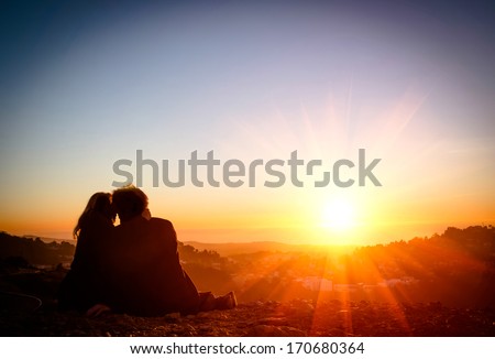 Couple in love enjoying tender moments during sunset at Twin Peaks in San Francisco - Emotional concept of relationship with travel boyfriend and girlfriends relaxing together  Royalty-Free Stock Photo #170680364