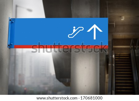 Escalators signage in the city
