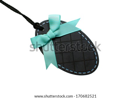 Black price tag or address label with beautiful azure bow.