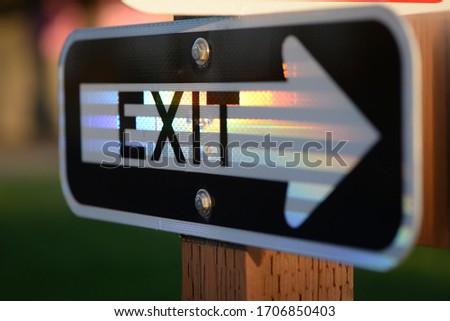 Signs exit direction signals pointing arrows