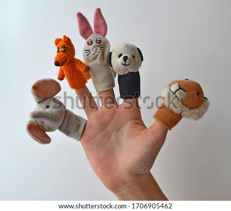 Dolls from a fairy tale on fingers for home children's theater