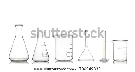 Collection of chemical glassware in laboratory isolated on white background. Royalty-Free Stock Photo #1706949835