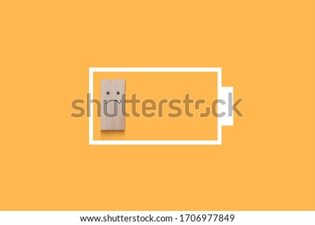 A dead battery, a symbol of lack of energy, fatigue, de-energization, sadness Royalty-Free Stock Photo #1706977849