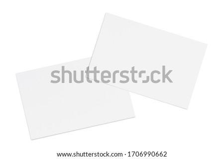 Two paper or plastic pieces (cards, tickets, flyers, invitations, coupons, banknotes, etc.), isolated on white background