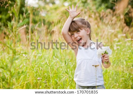 Little Girl Waving High outdoor Royalty-Free Stock Photo #170701835