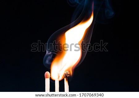 Flames and fire as matchsticks burn