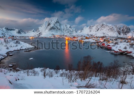 
View of amazing Lofoten Islands winter scenery with mountains and fiords in beautiful golden morning light at sunrise, Norway Royalty-Free Stock Photo #1707226204
