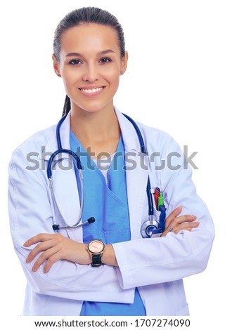 Woman doctor with stethoscope standing with arms crossed isolated on a white background