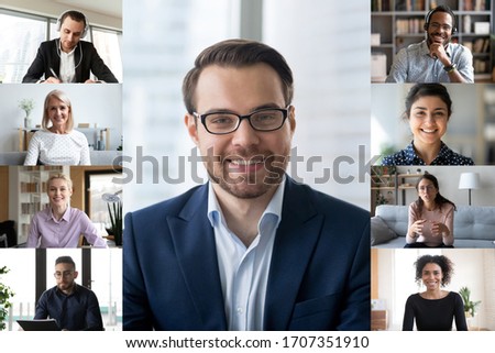 Full frame image computer screen webcamera view lot of multi racial businesspeople involved in group video call. Modern app technologies usage, distant communication, on-line meeting activity concept Royalty-Free Stock Photo #1707351910