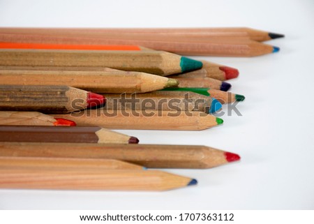 Colorful drawing pencils on white background