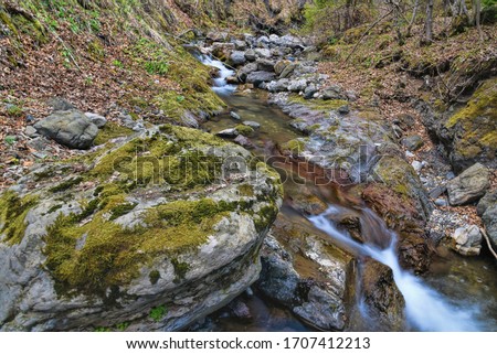 outdoor landscape photography of river with rocks