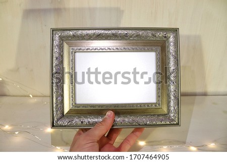 Photo frame on a background of light boards