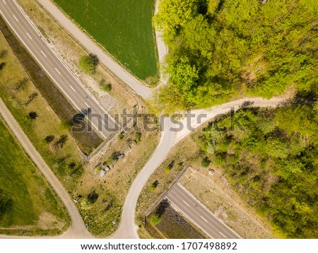 Aerial view of wildlife overpass over road in Switzerland Royalty-Free Stock Photo #1707498892
