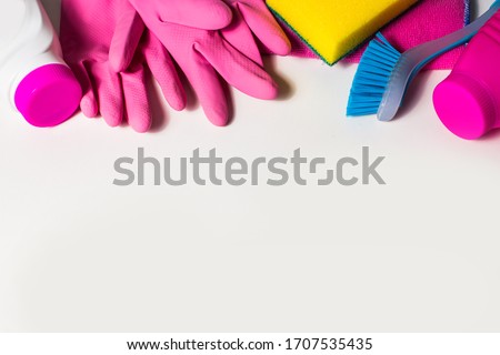 cleaning attributes, gloves, sponge brush, items for washing, top view on a white background, for text