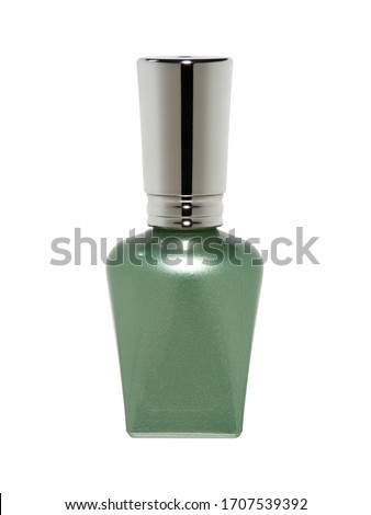 Green nail polish bottle isolated on white background
