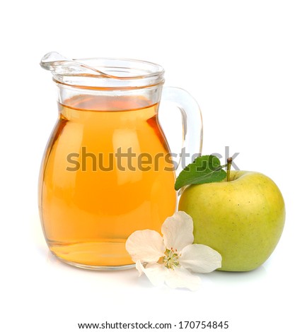 Apple juice on white background close up.