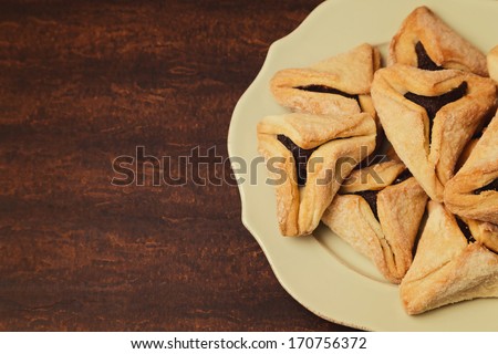 Hamantaschen cookies for Jewish festival of Purim on plate