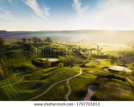 aerial view over a golf course landcape