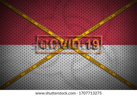 Indonesia flag and Covid-19 stamp with orange quarantine border tape cross. Coronavirus or 2019-nCov virus concept