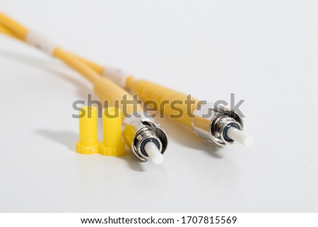 fiber optic cable connector with protect shield on white background. Close up