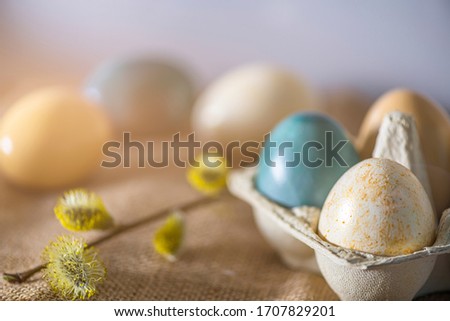 Holiday Easter card with easter eggs in a paper box