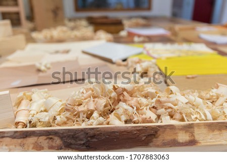 lots of wood shavings in a joinery