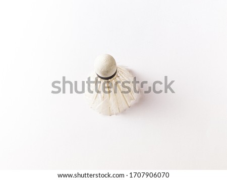 White Feather Shuttlecock with a white colour background stock isolated image. 
