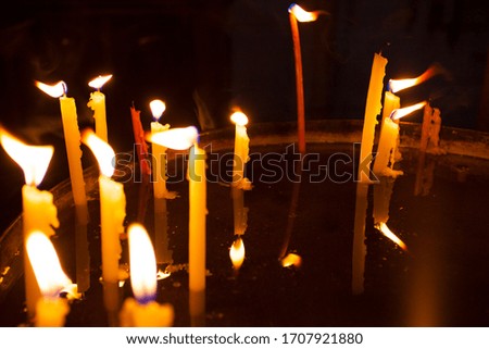 Candles light in the holy sepulchre cathedral in Jerusalem