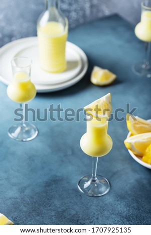 Italian liquor with lemons and cream, selective focus image