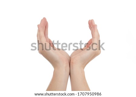 
close up hands young caucasian woman cupped cup on white isolated studio background