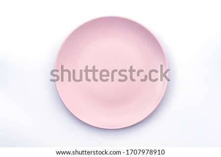 Empty Pink plate isolated on white background top view