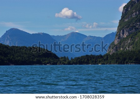 view of the dolomite mountains and lake of Molveno in the province of Trento -italy