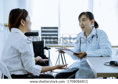 Female doctor consulting patient. Asian people