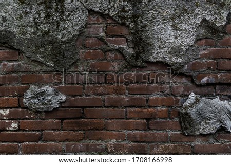 Old ruined historic protect wall. Shabby bumpy built front facade citadel. Worn damaged deserted partition of church courtyard. Vintage chipped spots stone mansion backyard. Grungy slum barrier for 3d
