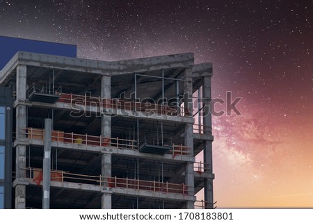Starry sky over construction tower