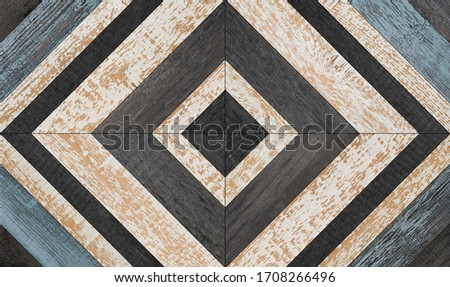 Shabby parquet  floor with geometric pattern.  Wooden boards texture.