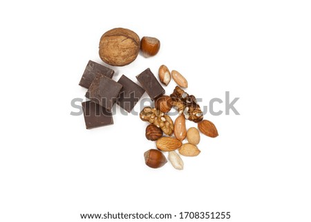 Dark chocolate with nuts isolated on a white background