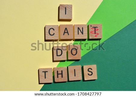 I Can't Do This, with T crossed out to leave the words I Can Do This, in 3d wooden alphabet letters isolated on green background