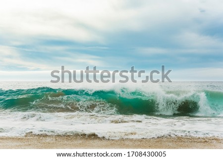 Stunning turquoise waves of the pacific ocean in Todos Santos, Baja California Sur/Mexico