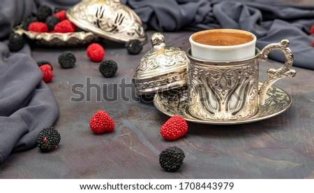 
Traditional Turkish Coffee served with copper cups and dessert Royalty-Free Stock Photo #1708443979